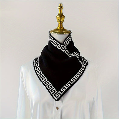 Women's vintage geometric scarf in black with white pattern, showcasing retro style and cozy warmth. Perfect for any season.