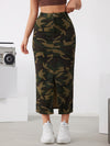 Fashionable camo denim midi skirt with slant pockets and side split design, perfect for casual outfits.