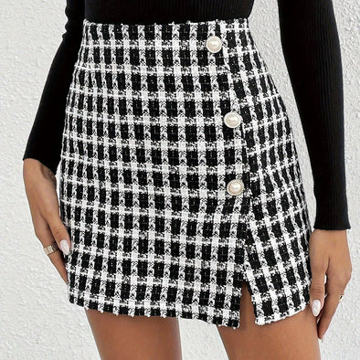 Elegant plaid asymmetrical skirt with button detail, perfect for fall/winter women's fashion, stylish and versatile.