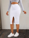 High-rise white denim skirt with front slit, styled casually with a crop top and white sneakers, perfect for everyday wear.